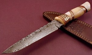 костяная рукоять